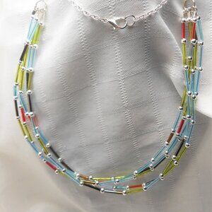 No872 Pretty handmade colored necklace made with acrylic tubes and metal beads